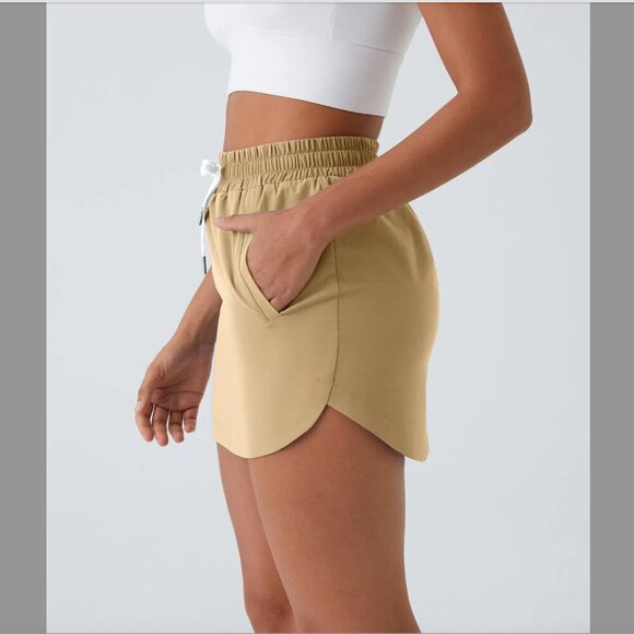 Women's L Halara High Waisted Drawstring Pocket Curved Hem Mini Golf Skirt - Picture 2 of 8